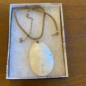 Vintage Mother of Pearl pendant on necklace.